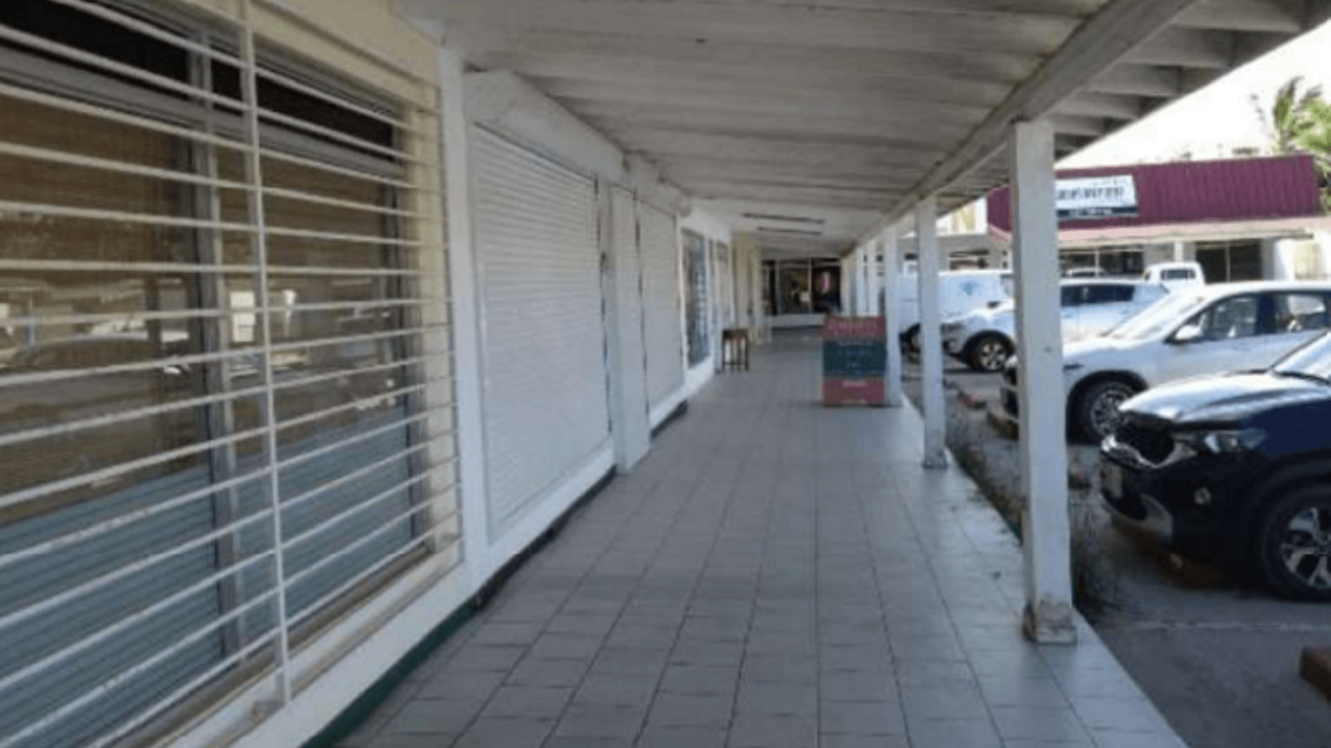 Commercial 69 Bubali exterior corridor with parking