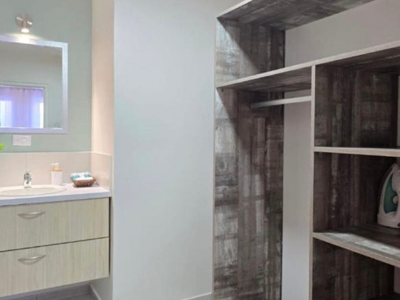 Condo 1 Rooi Santo Residence bathroom vanity and storage area