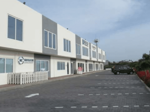 Magdalena Development Commercial Building exterior parking left side view