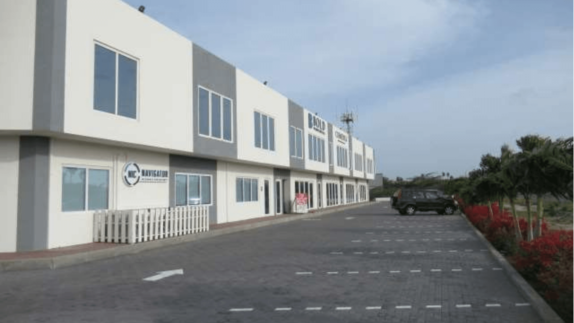 Magdalena Development Commercial Building exterior parking left side view