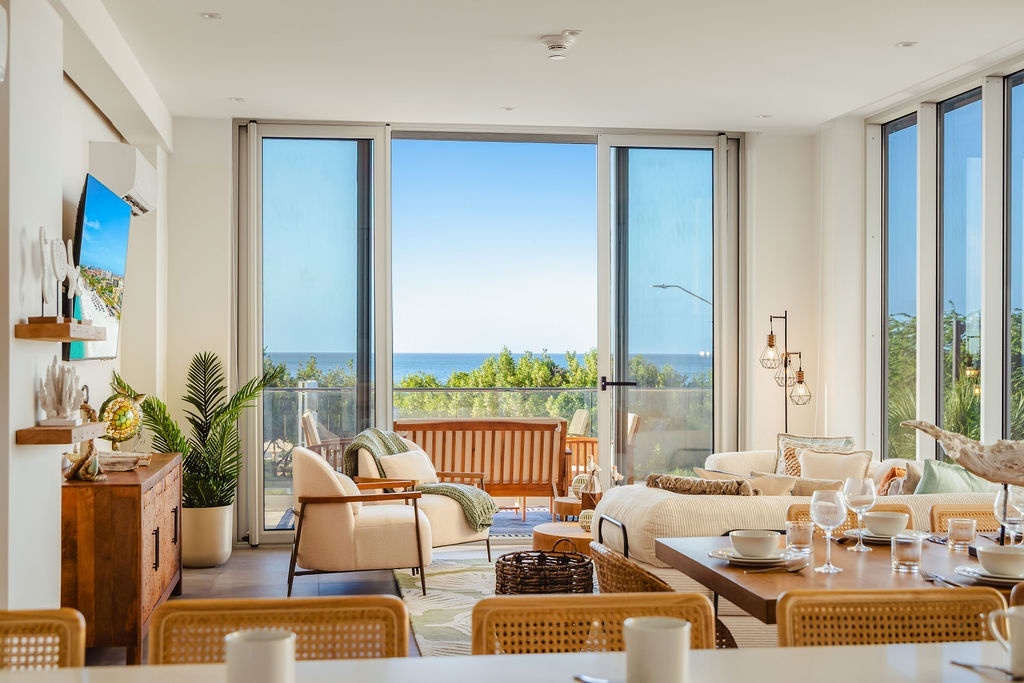 Spacious living room with ocean view at Reef 2B condo Aruba