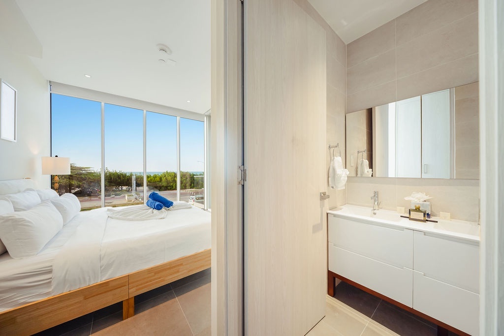 Open concept living and dining area Reef 2B Aruba condo