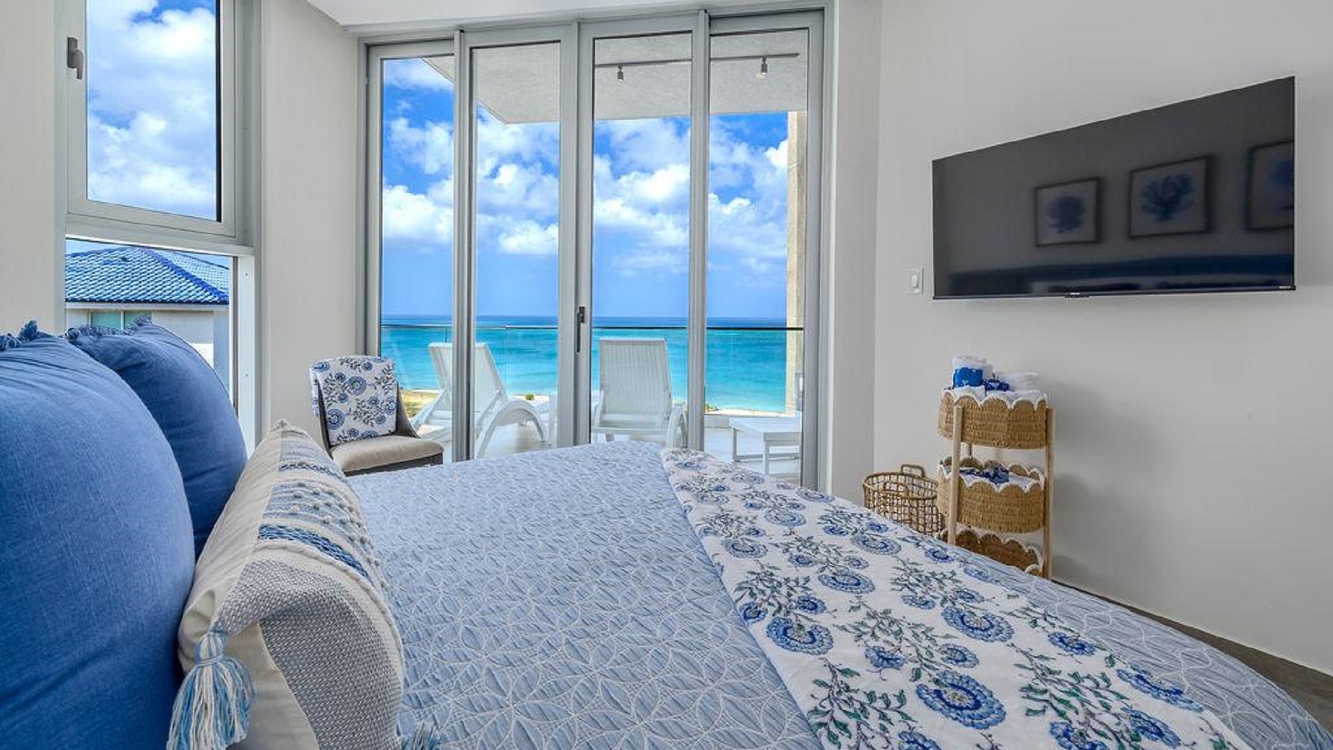Bedroom in Penthouse PHA at The Reef Residences with ocean view from bed in Eagle Beach Aruba