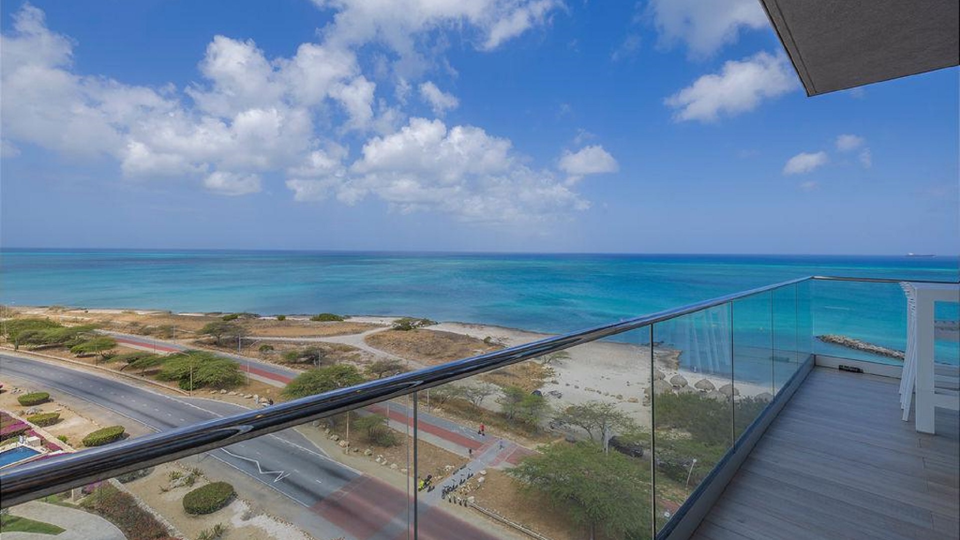 Ocean and coastline view from Reef Residences PHA penthouse overlooking Eagle Beach Aruba