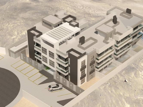 Front aerial rendering of Aracari Phase II condominiums with roundabout entrance in Aruba