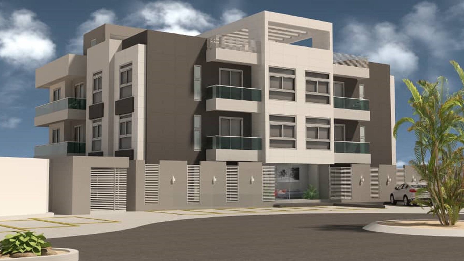 Poolside lounge chairs and outdoor relaxation area at Aracari Phase II condominiums in Aruba