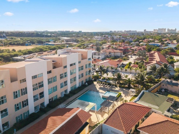 Aerial view of Aruba’s Life Garden 2 bedroom condo community with swimming pool