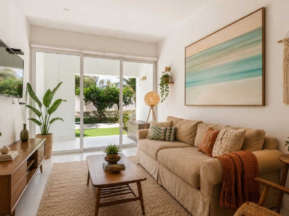 Staged living room with modern decor at Aruba’s Life Garden 2 bedroom condo in Aruba.