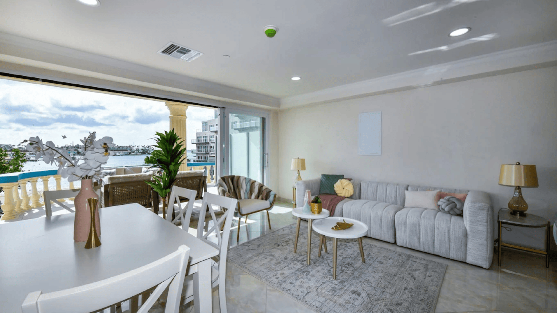 Luxury oceanfront residence interior in Aruba with balcony and waterfront views