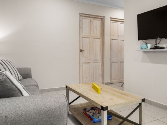 Alternate view of the living room in the Summerside 2-bedroom condo in Rooi Santo, Aruba