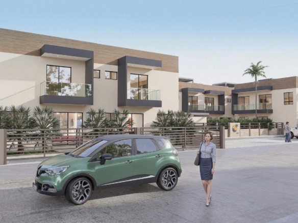 Exterior community view of Summerside III townhouse featuring modern architecture and landscaped surroundings