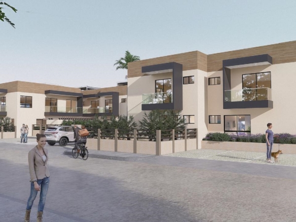 Modern exterior frontage of Summerside III townhouse featuring balconies, landscaping, and parked vehicles