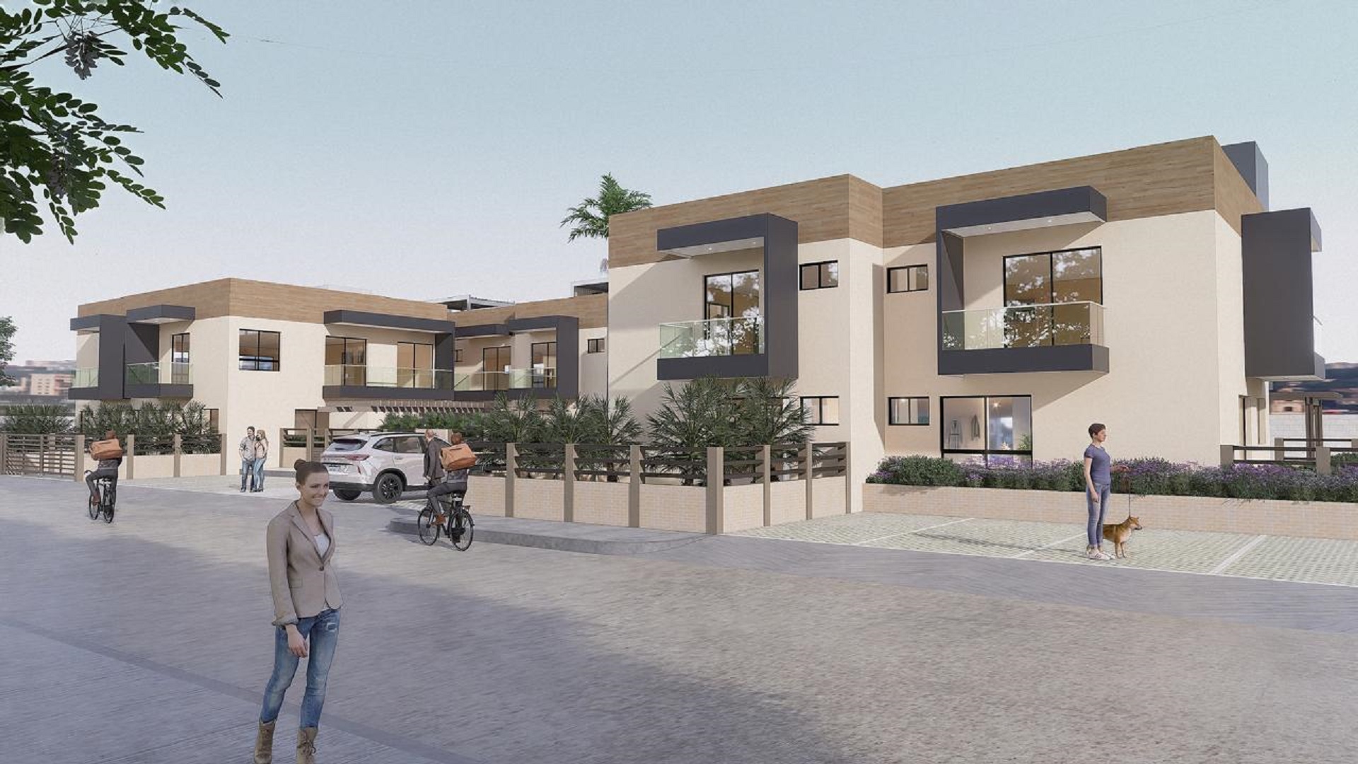 Modern exterior frontage of Summerside III townhouse featuring balconies, landscaping, and parked vehicles