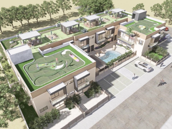 Rooftop lounge and outdoor seating area at Summerside III townhouse community with greenery and shaded pergola