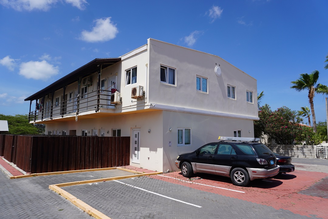 Front exterior view of the apartment building located in Alto Vista, Aruba.