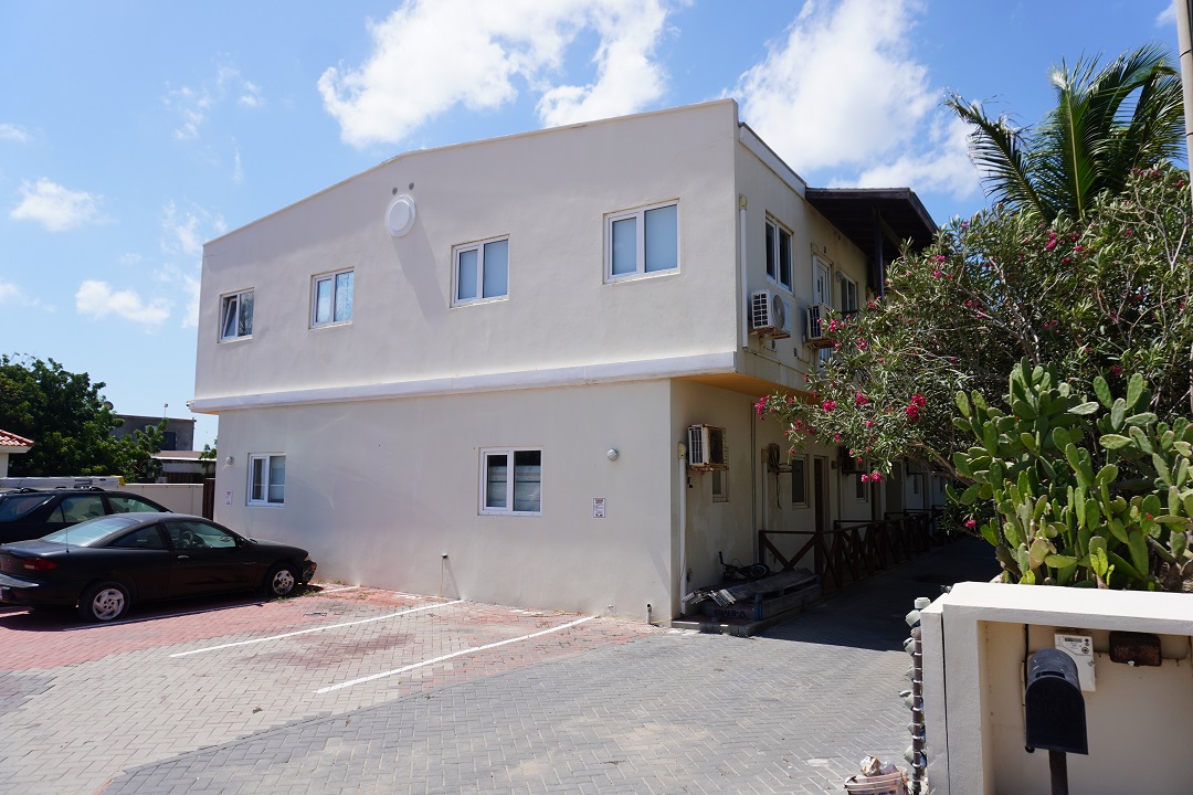 Private fenced patio areas attached to the Alto Vista apartment property.