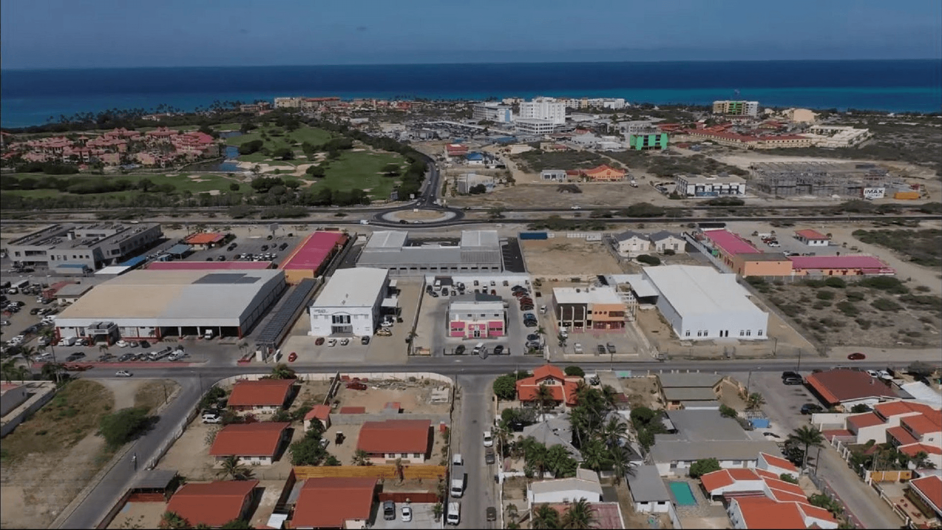 Elevated aerial view of the Commercial Office Space for Rent at Schotlandstraat 77-A Aruba and the surrounding commercial and residential area
