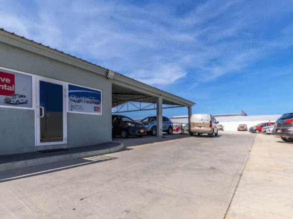Front office entrance area at the Commercial Office Space for Rent at Schotlandstraat 77-A Aruba with covered parking and vehicle access.