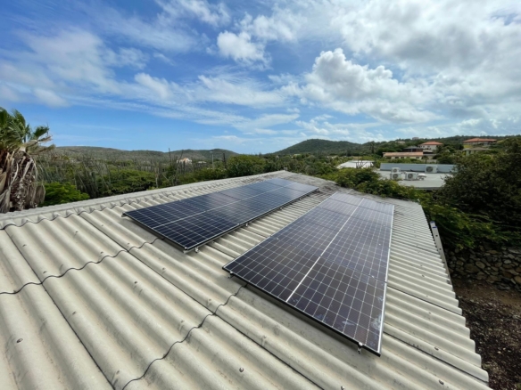 Solar panel installation on the roof of the container house in Santa Cruz, Aruba.