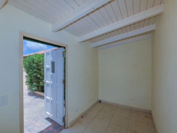 Small multipurpose room with high ceiling and direct outdoor access at Tanki Leendert 123-B Aruba.