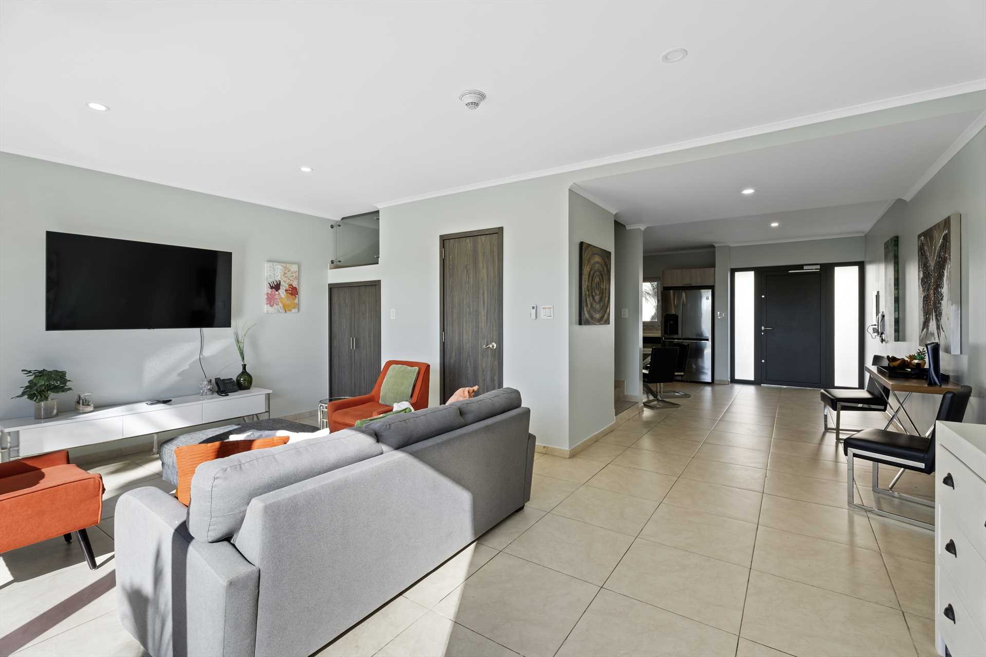Open living area and entryway inside LeVent Townhouse 13 near Eagle Beach, Aruba